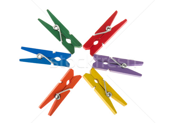 Colorful clothes pins in a circle Stock photo © ivonnewierink