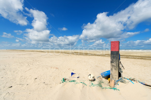 Stock photo: Wooden pole at the beach