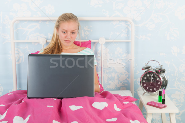Teen girl with laptop Stock photo © ivonnewierink