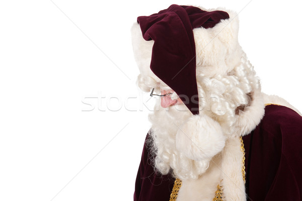 Święty mikołaj patrząc w dół odizolowany biały portret studio Zdjęcia stock © ivonnewierink