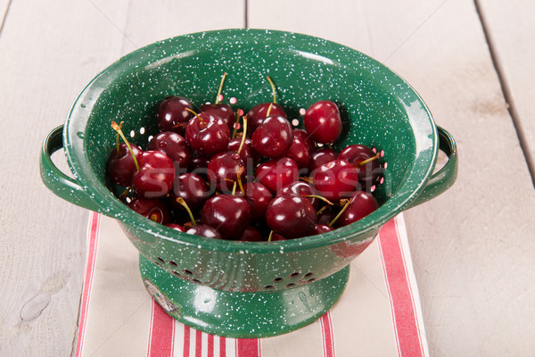 Fresh cherries in colander Stock photo © ivonnewierink