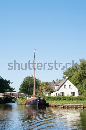 With boat in Dutch village Stock photo © ivonnewierink