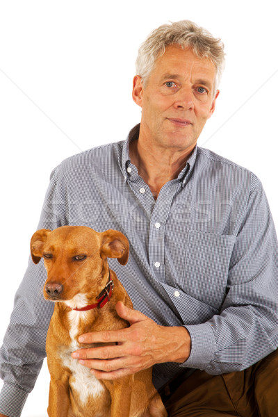 Ancianos hombre perro pequeño perro marrón amigos Foto stock © ivonnewierink