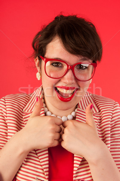 Jeune femme verres rouge sérieux portrait femme [[stock_photo]] © ivonnewierink