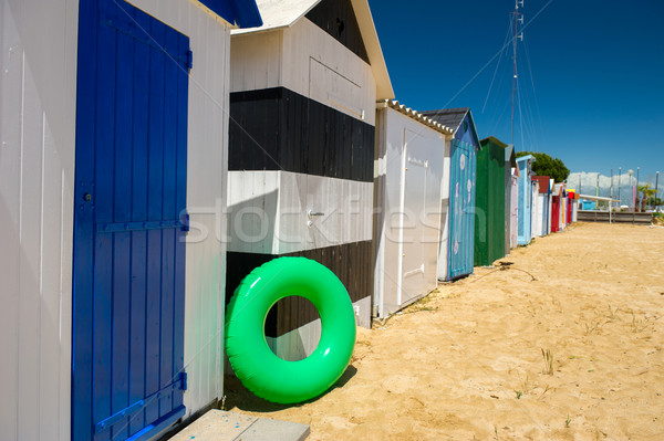 Strand kleurrijk zand zwemmen huizen kleuren Stockfoto © ivonnewierink