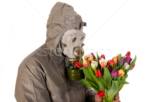 Adam gaz maskesi koruma takım elbise renkli çiçekler Stok fotoğraf © ivonnewierink