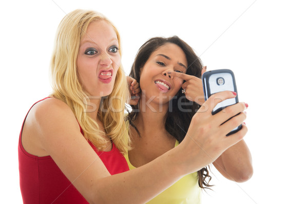 Freundinnen Aufnahme mad Handy Gesicht Telefon Stock foto © ivonnewierink