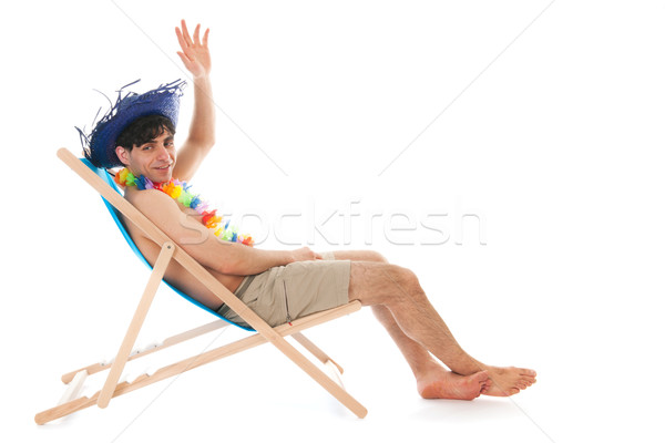 Genç plaj tropikal şapka oturma şezlong Stok fotoğraf © ivonnewierink