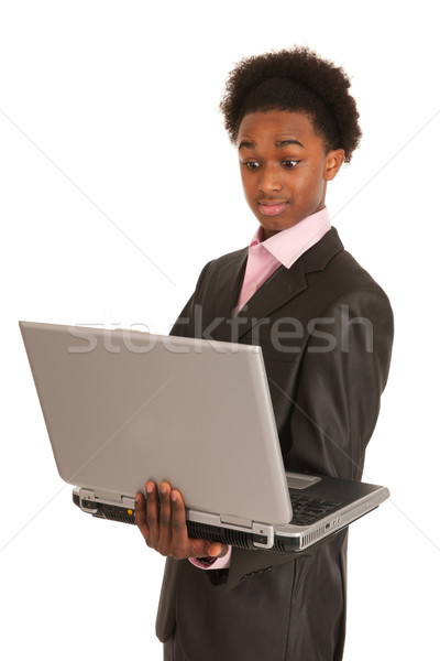 Czarny człowiek biznesu zdziwiony laptop patrząc działalności Zdjęcia stock © ivonnewierink