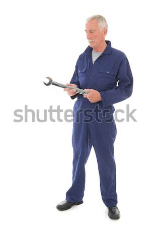 Człowiek niebieski klucz starszy pracy Zdjęcia stock © ivonnewierink