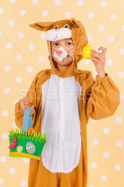 Child as easter hare with eggs Stock photo © ivonnewierink