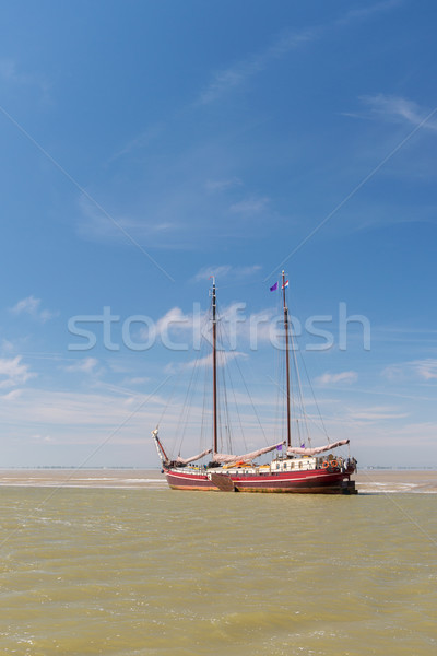 Clipper on Dutch wadden sea Stock photo © ivonnewierink