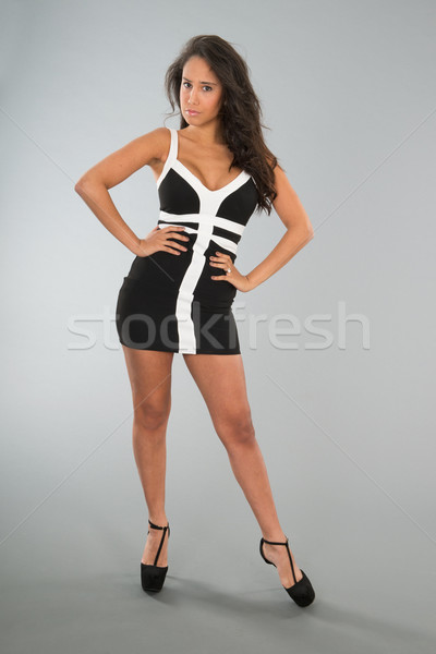 Atrakcyjny młoda kobieta stałego prowokacyjny szary czarno białe Zdjęcia stock © ivonnewierink
