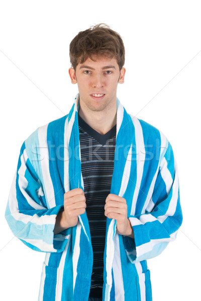 Young man in pajamas and gown Stock photo © ivonnewierink