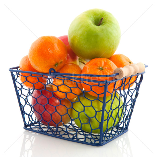 Bevásárlókosár gyümölcs áruház friss gyümölcs kék piros Stock fotó © ivonnewierink