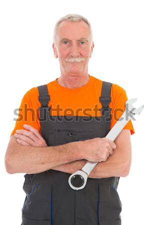 [[stock_photo]]: Homme · orange · gris · clé · supérieurs