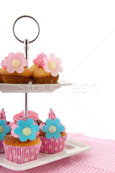 Stock photo: Many cupcakes at cake layer