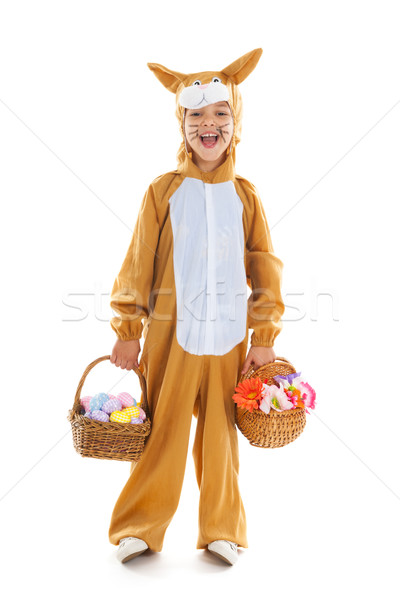 Child as easter hare with eggs and flowers Stock photo © ivonnewierink