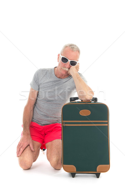 Reiziger vertraging koffer geïsoleerd witte achtergrond Stockfoto © ivonnewierink