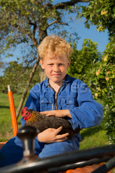 Farm Boy with tractor Stock photo © ivonnewierink