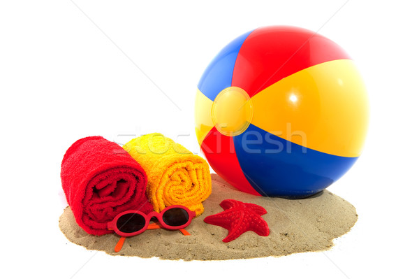 Strandlabda műanyag színes labda homok tengerpart Stock fotó © ivonnewierink