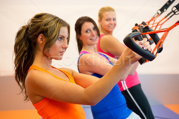 Jeune femme suspension formation santé club fille [[stock_photo]] © ivonnewierink