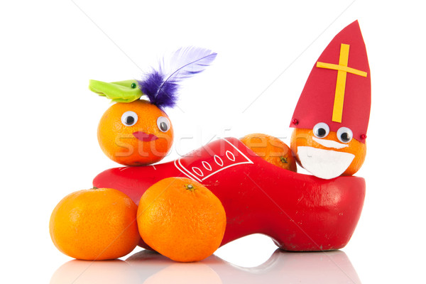 Dutch Sinterklaas and black Peten as mandarins in clog Stock photo © ivonnewierink