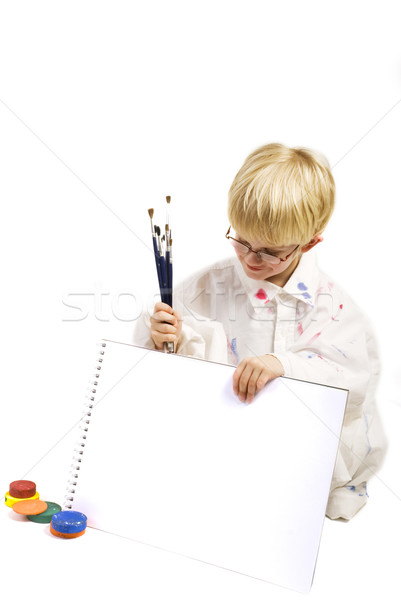 Orgulhoso inteligente menino criança óculos pintura Foto stock © ivonnewierink