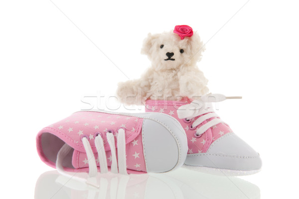 Menina nascido branco mão ursinho de pelúcia rosa Foto stock © ivonnewierink