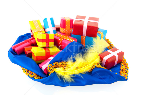 Hat of black Pete with many presents Stock photo © ivonnewierink