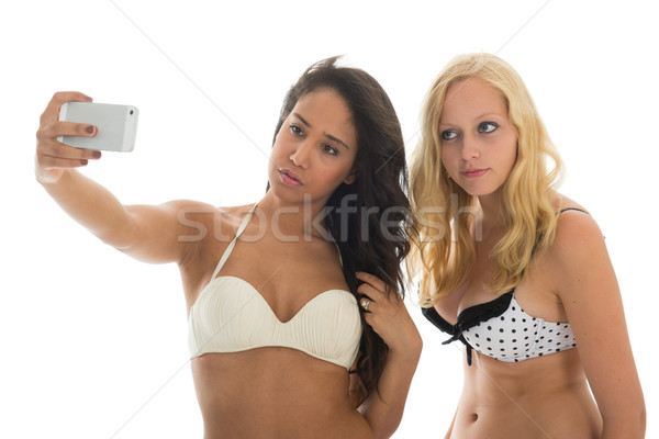 Lány barátok tengerpart készít feketefehér bikini nő Stock fotó © ivonnewierink