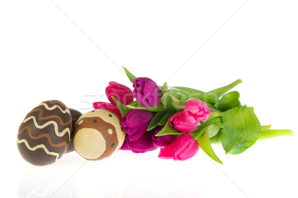 Chocolate easter eggs with tulips Stock photo © ivonnewierink