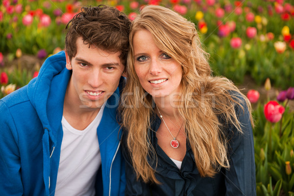 Young couple in Dutch flower fields Stock photo © ivonnewierink