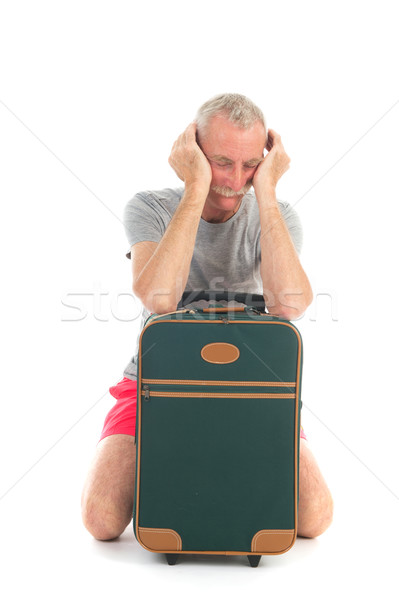 Viaggiatore ritardare valigia isolato bianco sfondo Foto d'archivio © ivonnewierink