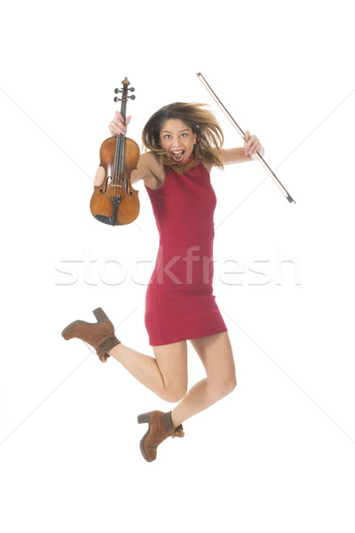 Jumping high with violin Stock photo © ivonnewierink