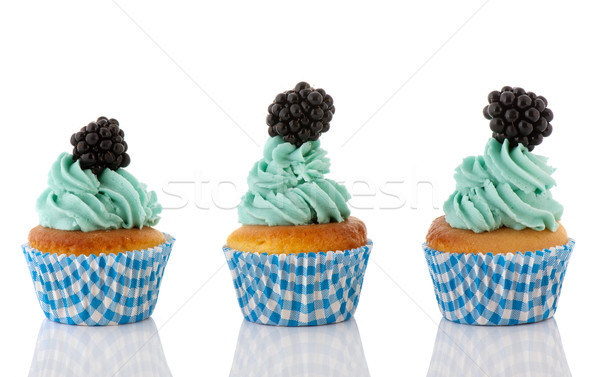 Cupcake in blue and green with fruit Stock photo © ivonnewierink