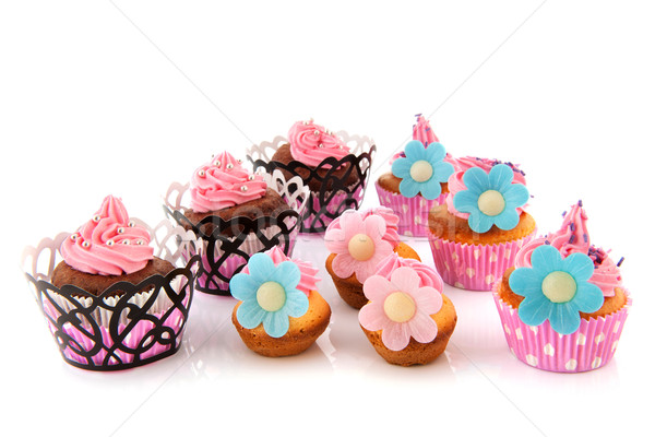 Stock photo: Many colorful cupcakes