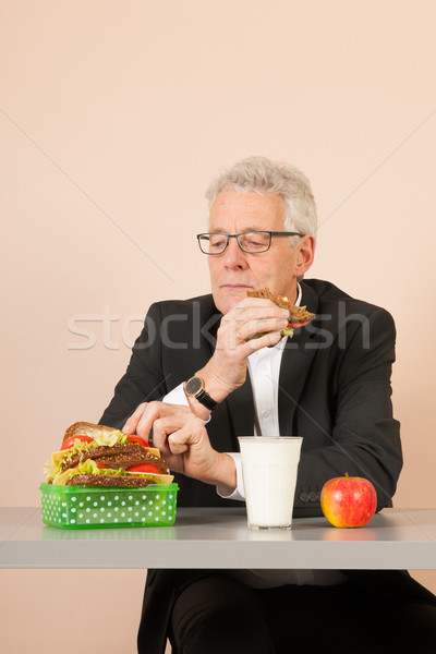 Supérieurs homme d'affaires déjeuner manger pain [[stock_photo]] © ivonnewierink