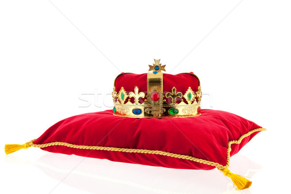 Złoty korony aksamitu poduszkę czerwony tle Zdjęcia stock © ivonnewierink