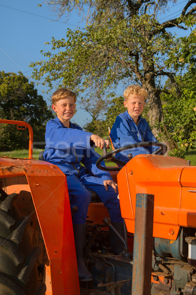 Farm Boys with tractor Stock photo © ivonnewierink