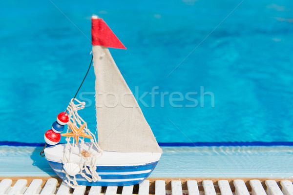 Сток-фото: игрушку · Бассейн · миниатюрный · лодка · лет · бассейна