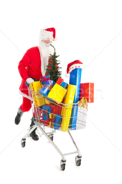 サンタクロース を実行して ショッピングカート フル 高級 プレゼント ストックフォト © ivonnewierink