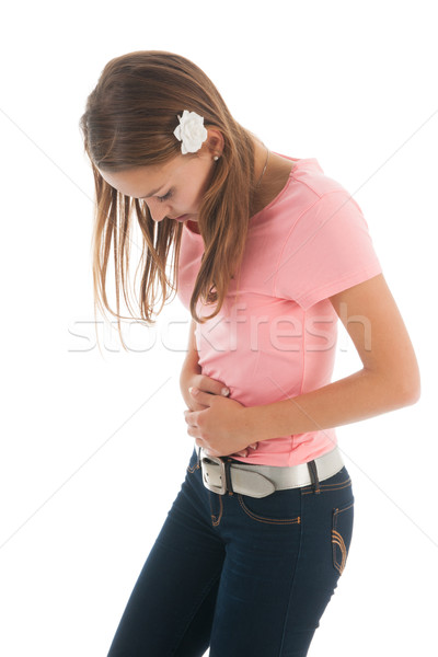 Teen girl ból brzucha brzuch ból odizolowany biały Zdjęcia stock © ivonnewierink