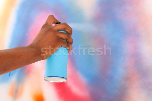 Graffiti aeroszol kéz kék városi festmény Stock fotó © ivonnewierink