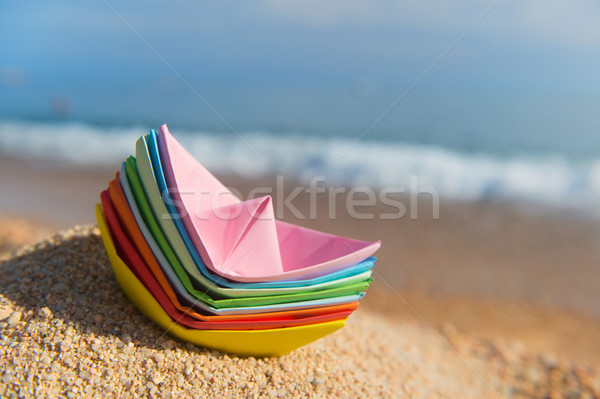 Paper boats at the beach Stock photo © ivonnewierink
