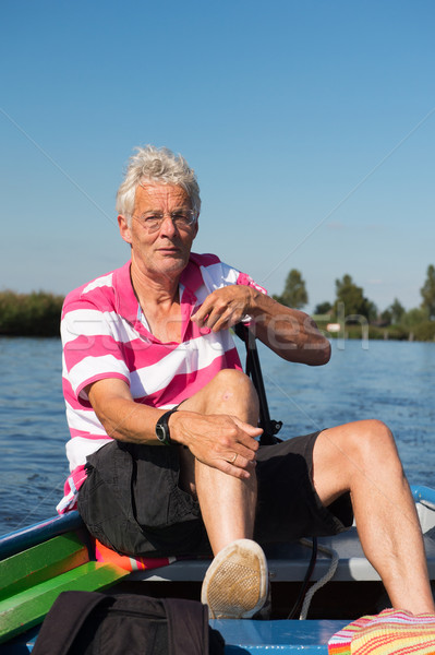 Homem barco rio idoso paisagem verão Foto stock © ivonnewierink