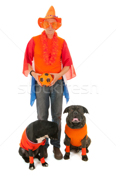 man with his dogs as Dutch soccer supporters Stock photo © ivonnewierink