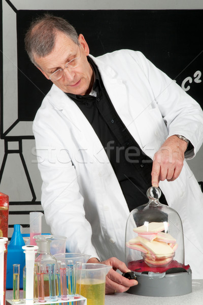 Professor is testing with candy Stock photo © ivonnewierink