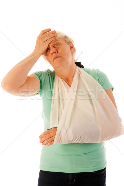 歳の女性 壊れた 手首 石こう 青 孤立した ストックフォト © ivonnewierink