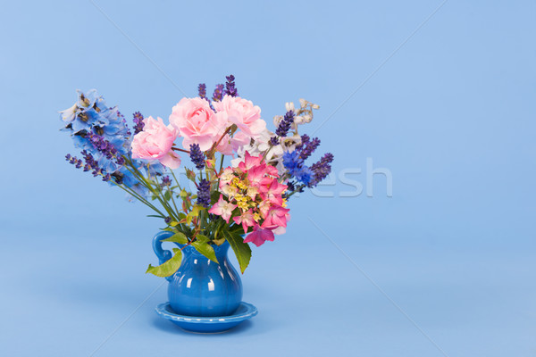 mixed colorful bouquet on blue background Stock photo © ivonnewierink